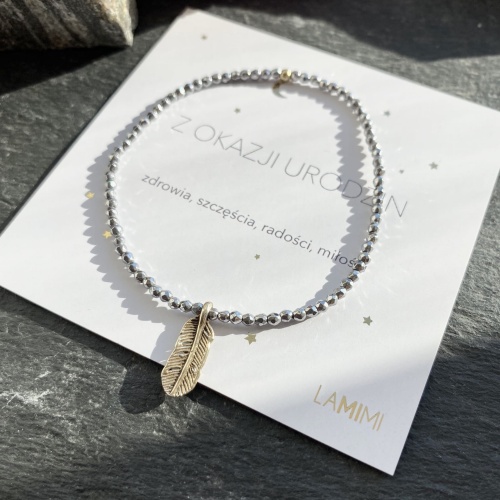 bransoletka-zawieszka-piórko