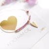 Elegancka bransoletka z naturalnym granatem i zawieszką serce