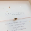 bransoletka przynoszaca szczęście z diamentem.webp